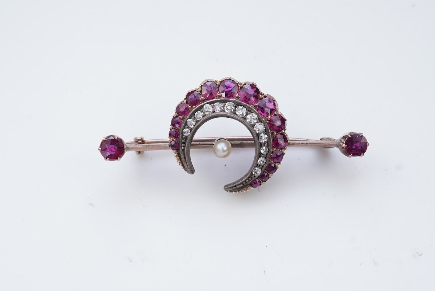 A Victorian ruby and diamond bar brooch, late 19th century
